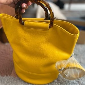7 for all man kind yellow purse
